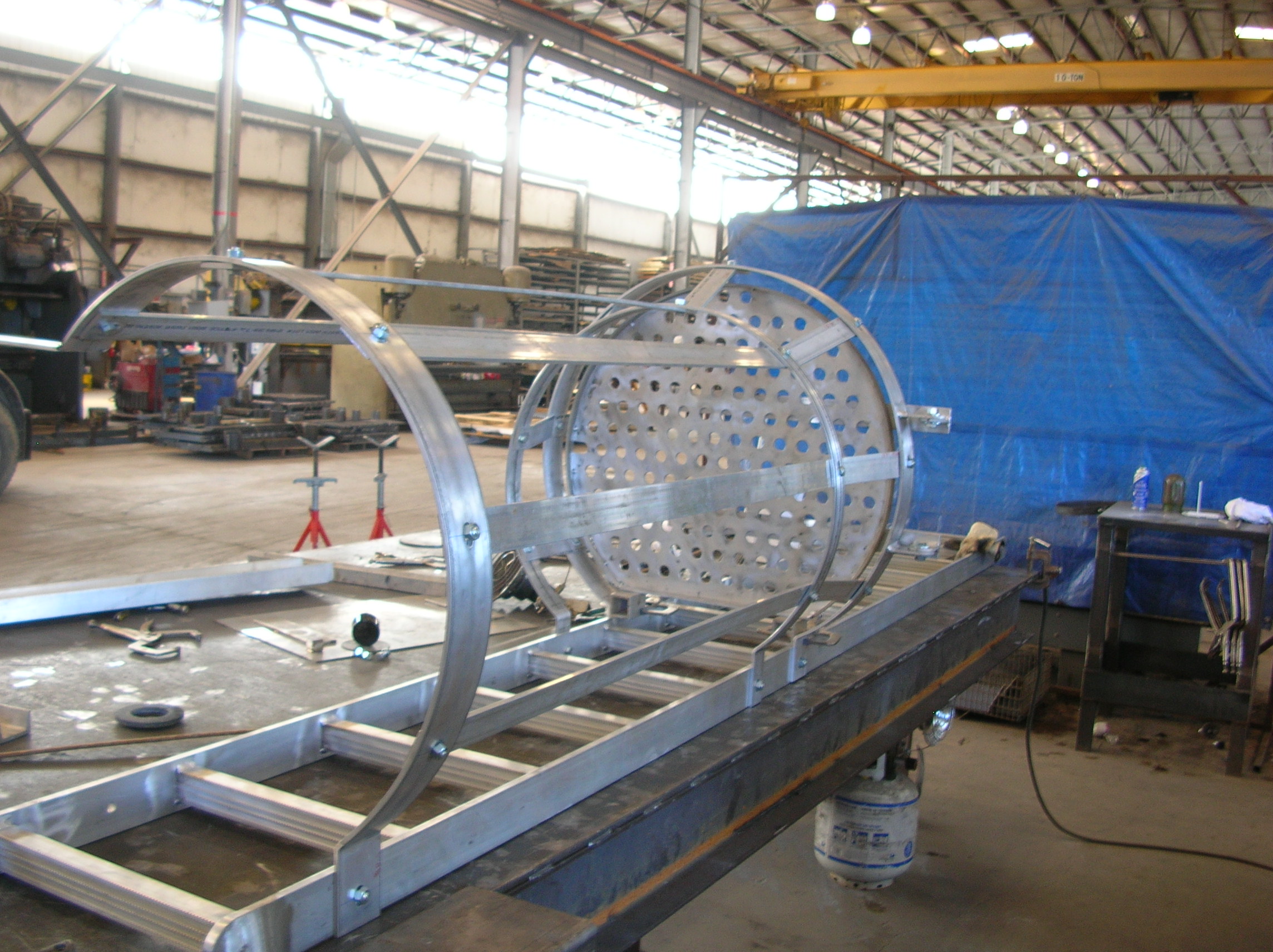 Industrial side step ladder being fabricated Industrial side step ladder